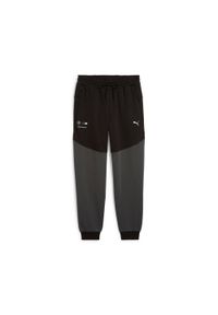 Spodnie dresowe Puma BMW MMS Tech. Kolor: czarny. Materiał: dresówka. Styl: elegancki #1