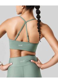CASALL - Stanik Casall Sleek Strappy Sports Bra. Kolor: zielony. Sport: joga i pilates