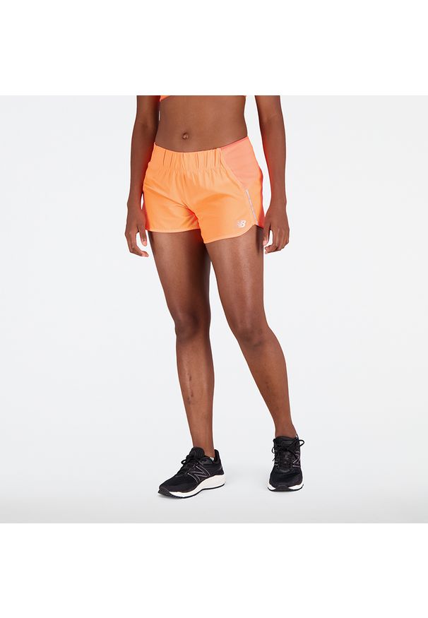 Spodenki damskie New Balance WS21267NDF – pomarańczowe. Kolor: pomarańczowy. Materiał: materiał, poliester. Sport: fitness