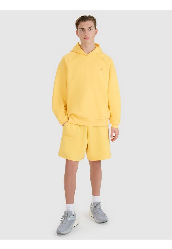 4f - 4F Spodenki dresowe uniseks - żółte S. Okazja: na co dzień. Kolor: żółty. Materiał: dresówka. Długość: krótkie. Wzór: gładki, ze splotem. Styl: casual, sportowy