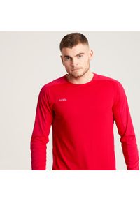 KIPSTA - Koszulka do piłki nożnej z długim rękawem Kipsta Viralto Club. Kolor: czerwony. Materiał: materiał. Długość rękawa: długi rękaw. Długość: długie. Sport: piłka nożna