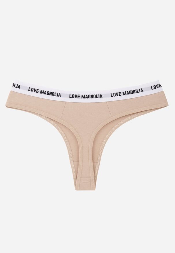 Renee - Beżowe Majtki Stringi z Bawełną Ozdobione Napisami Amero. Kolor: beżowy. Materiał: bawełna. Wzór: napisy, aplikacja