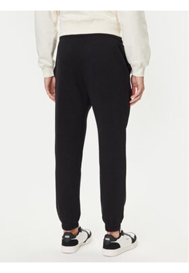 Jack & Jones Spodnie dresowe Kane Billy 12283257 Czarny Relaxed Fit. Kolor: czarny. Materiał: bawełna, syntetyk