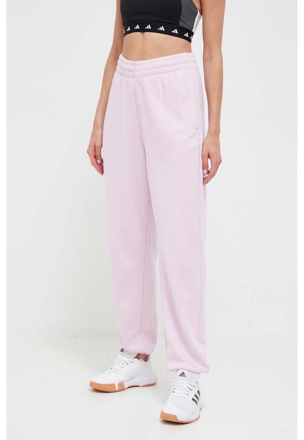 adidas Originals spodnie dresowe kolor różowy gładkie. Stan: podwyższony. Kolor: różowy. Materiał: dresówka. Wzór: gładki