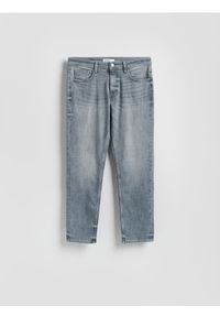 Reserved - Jeansy slim z efektem sprania - jasnoszary. Kolor: szary