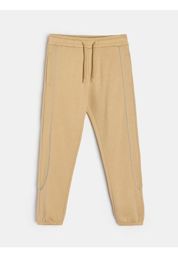Sinsay - Spodnie dresowe - beżowy. Kolor: beżowy. Materiał: dresówka