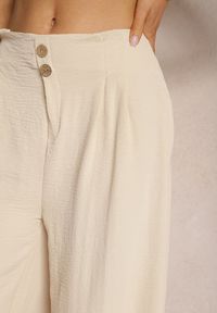 Renee - Beżowe Spodnie w Stylu Alladynek High Waist Wykończone Gumką w Pasie Riselma. Okazja: na co dzień. Stan: podwyższony. Kolor: beżowy. Styl: sportowy, casual #3
