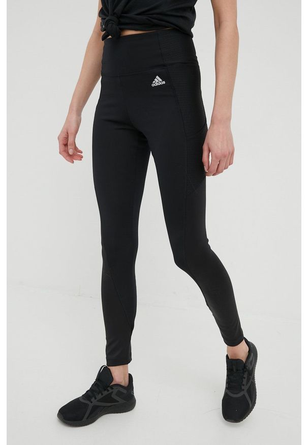 Adidas - adidas legginsy treningowe x Zoe Saldana HB1488 damskie kolor czarny gładkie. Kolor: czarny. Materiał: skóra, dzianina, materiał. Wzór: gładki. Sport: fitness