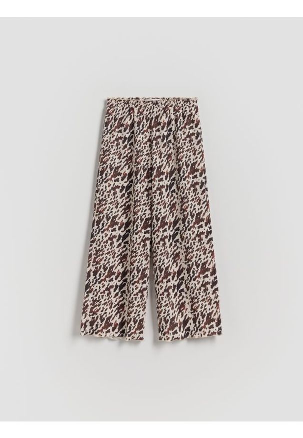Reserved - Spodnie we wzory - wielobarwny. Materiał: tkanina