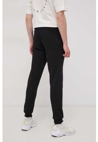 Jack & Jones Spodnie męskie kolor czarny gładkie. Kolor: czarny. Materiał: dzianina. Wzór: gładki