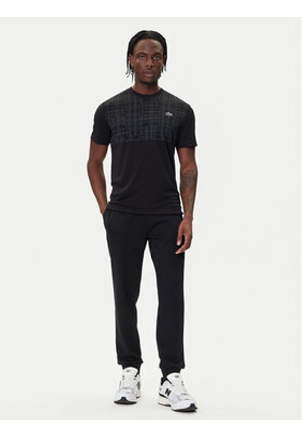 Lacoste Koszulka techniczna TH4782 Czarny Regular Fit. Kolor: czarny. Materiał: syntetyk