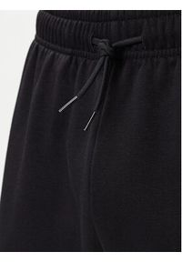 The North Face Spodnie dresowe Simple Dome NF0A8C1W Czarny Regular Fit. Kolor: czarny. Materiał: bawełna