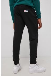 Superdry Spodnie męskie kolor czarny gładkie. Kolor: czarny. Wzór: gładki #4