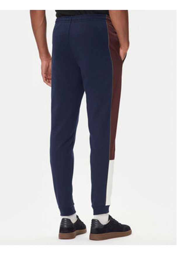 Lacoste Spodnie dresowe XH5923 Granatowy Regular Fit. Kolor: niebieski. Materiał: bawełna