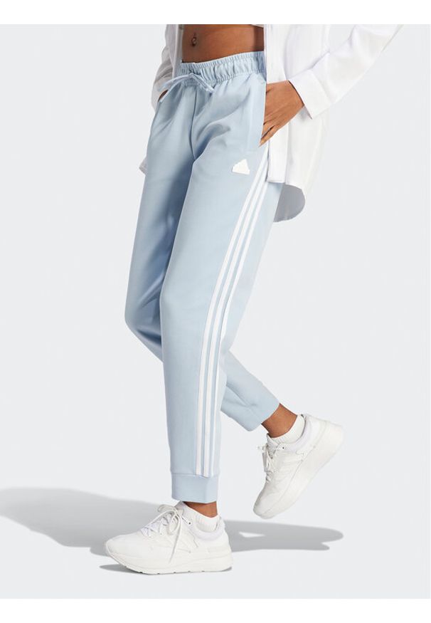 Adidas - adidas Spodnie dresowe Future Icons 3-Stripes IM2545 Błękitny Regular Fit. Kolor: niebieski. Materiał: bawełna