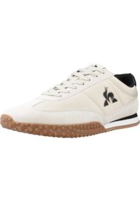 Le Coq Sportif - Kapcie LE COQ SPORTIF VELOCE I Beżowy. Kolor: beżowy. Materiał: tkanina