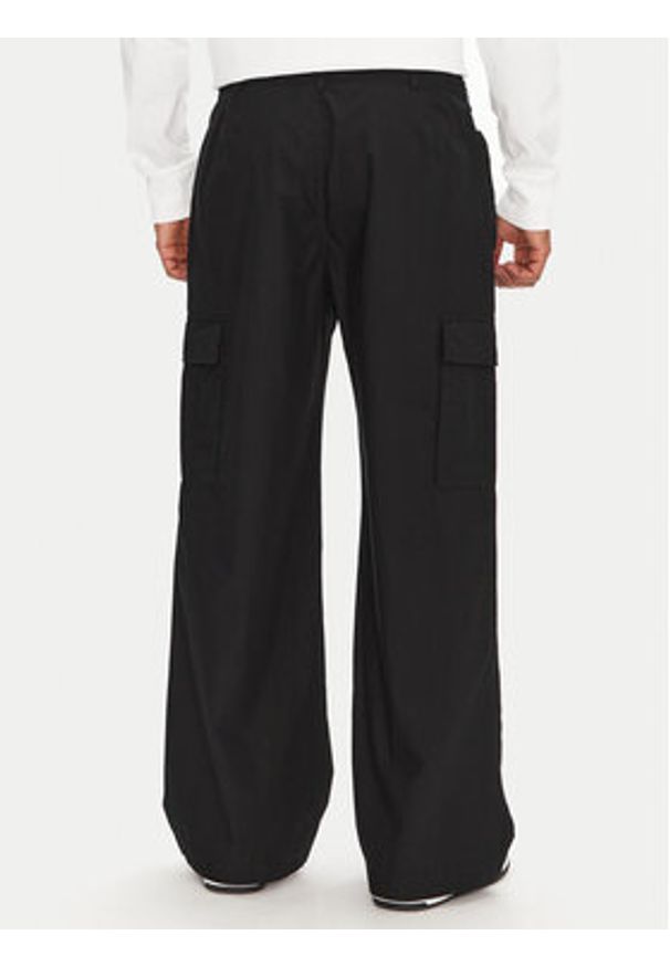 Champion Spodnie cargo 220763 Czarny Relaxed Fit. Kolor: czarny. Materiał: bawełna
