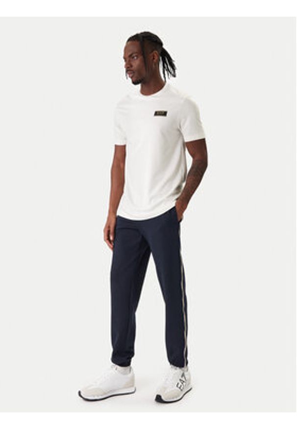 EA7 Emporio Armani Spodnie dresowe 7M001482 AF12660 UB102 Granatowy Regular Fit. Kolor: niebieski. Materiał: bawełna, syntetyk