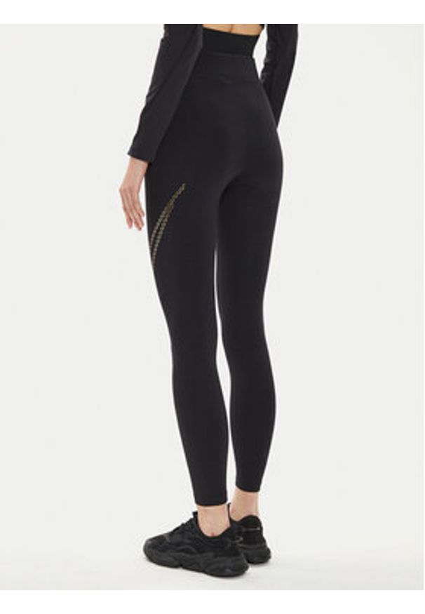 Nike Legginsy FB8766 Czarny Tight Fit. Kolor: czarny. Materiał: bawełna, syntetyk