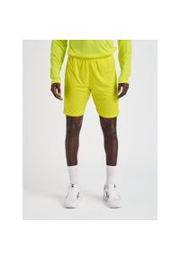 Spodenki piłkarskie męskie Hummel Core XK Poly Shorts. Kolor: żółty. Sport: piłka nożna #1