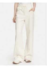 Guess Spodnie dresowe W6YB31 K5319 Kremowy Wide Leg. Kolor: kremowy. Materiał: bawełna #1
