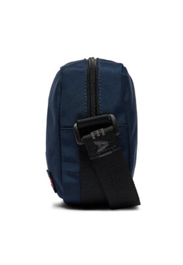 Tommy Jeans Saszetka Tjw Essential Daily Crossover AW0AW15818 Granatowy. Kolor: niebieski. Materiał: materiał