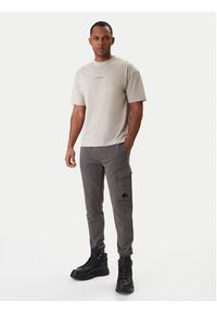 C.P. Company Spodnie dresowe 20CMSP067A110044R Szary Slim Fit. Kolor: szary. Materiał: bawełna #3