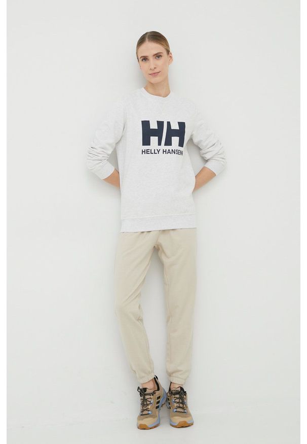 Helly Hansen bluza damska kolor różowy z nadrukiem. Okazja: na co dzień. Kolor: szary. Materiał: dzianina, bawełna. Długość rękawa: długi rękaw. Długość: długie. Wzór: nadruk. Styl: casual