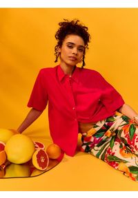 Sinsay - Wiskozowe spodnie wide leg z nadrukiem kwiatowym - wielobarwny. Materiał: wiskoza. Wzór: kwiaty, nadruk #1