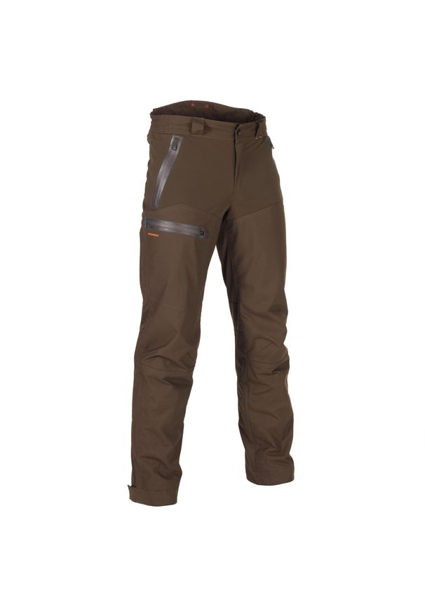 SOLOGNAC - Spodnie myśliwskie wodoodporne Solognac Renfort 900. Kolor: brązowy. Materiał: tkanina, materiał