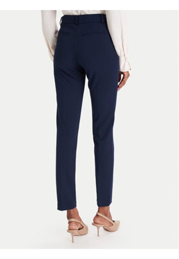 Rinascimento Chinosy CFC0126226003 Granatowy Slim Fit. Kolor: niebieski. Materiał: syntetyk