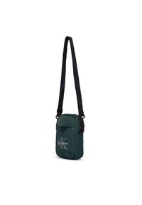 Calvin Klein Saszetka Bold Logo Nylon Slim Reporter LV04D3231G Zielony. Kolor: zielony. Materiał: materiał #4