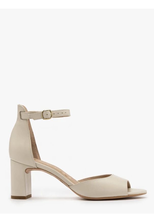 Ryłko - Klasyczne kremowe sandały na obcasie. Kolor: beżowy. Materiał: skóra. Obcas: na obcasie. Styl: klasyczny. Wysokość obcasa: średni