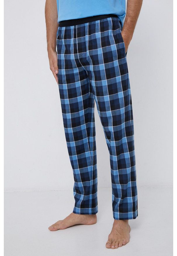 BOSS - Boss - Spodnie piżamowe bawełniane. Kolor: niebieski. Materiał: bawełna