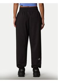 The North Face Spodnie dresowe Essential NF0A8C1G Czarny Relaxed Fit. Kolor: czarny. Materiał: syntetyk, bawełna #4
