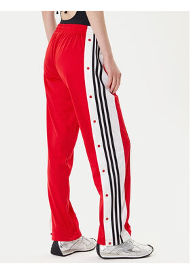 Adidas - adidas Spodnie dresowe Adibreak JY1354 Czerwony Loose Fit. Kolor: czerwony. Materiał: syntetyk