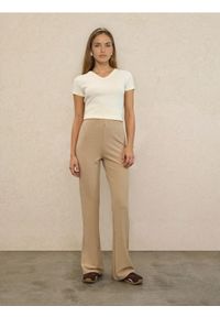 Sinsay - Spodnie flare - beżowy. Kolor: beżowy #1