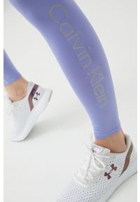Calvin Klein Performance legginsy treningowe CK Essentials damskie kolor fioletowy z nadrukiem. Kolor: fioletowy. Materiał: skóra, dzianina. Wzór: nadruk