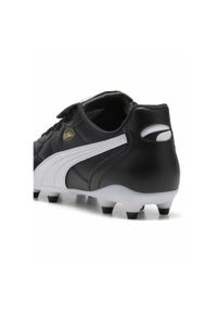 Puma - Buty piłkarskie unisex KING TOP FG/AG PUMA Black White Gold. Kolor: czarny, biały, wielokolorowy. Sport: piłka nożna
