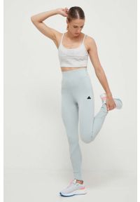 Adidas - adidas legginsy Z.N.E damskie kolor zielony gładkie. Stan: podwyższony. Kolor: zielony. Materiał: skóra, dzianina, materiał. Wzór: gładki. Sport: fitness #2
