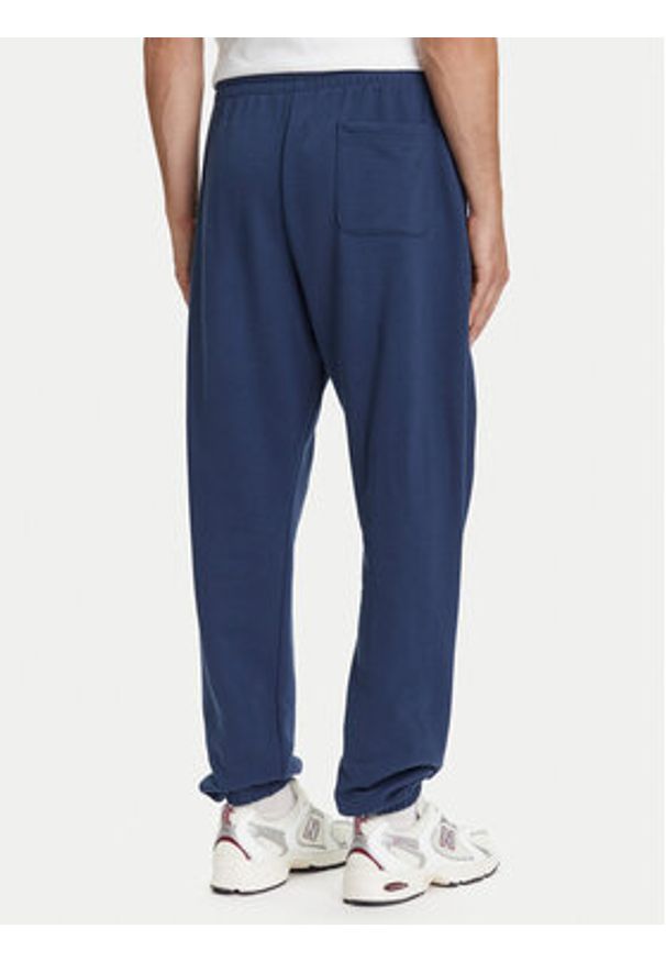 New Balance Spodnie dresowe Essentials MP41519 Granatowy Relaxed Fit. Kolor: niebieski. Materiał: syntetyk, bawełna