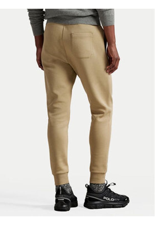 Polo Ralph Lauren Spodnie dresowe 710881518082 Beżowy Regular Fit. Kolor: beżowy. Materiał: bawełna