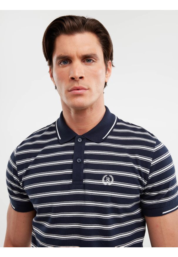 Big-Star - Koszulka męska polo w paski granatowa Meggon 403. Typ kołnierza: polo. Kolor: niebieski. Materiał: dzianina. Wzór: paski. Styl: elegancki