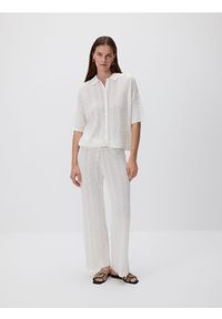 Reserved - Dzianinowe spodnie z wiskozą - kremowy. Kolor: kremowy. Materiał: wiskoza, dzianina #1