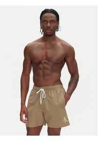 Calvin Klein Swimwear Szorty kąpielowe KM0KM01101 Khaki Regular Fit. Kolor: brązowy. Materiał: syntetyk