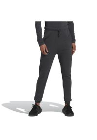 Adidas - Spodnie adidas Studio Lounge High Waist HH8514 - czarne. Stan: podwyższony. Kolor: czarny. Materiał: materiał, bawełna, dresówka, lyocell. Sport: turystyka piesza, fitness #1