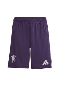 Adidas - Szorty Manchester United 25/26 Away Kids. Kolor: fioletowy. Sport: piłka nożna