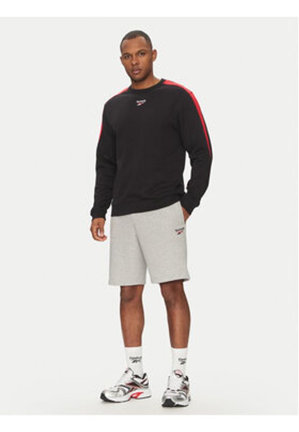 Reebok Bluza 100215502 Czarny Regular Fit. Kolor: czarny. Materiał: bawełna