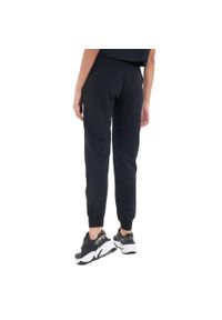 Nike - Spodnie Do Joggingu Damskie Polar Essential. Kolor: czarny. Materiał: polar. Sport: bieganie