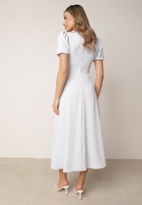 Born2be - Niebieska Elegancka Sukienka VICES o Rozkloszowanym Kroju z Krótkim Rękawem Aezith. Okazja: na komunię, na wesele, na ślub cywilny. Kolor: niebieski. Długość rękawa: krótki rękaw. Typ sukienki: proste, rozkloszowane. Styl: elegancki #6